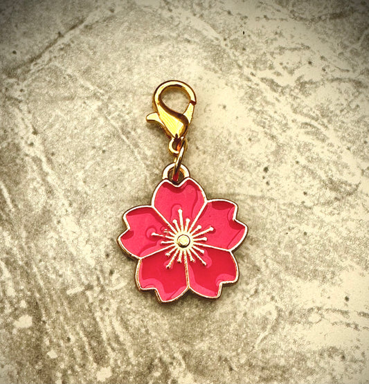 Pink floral charm.         (😄. Uk. FREE DELIVERY)