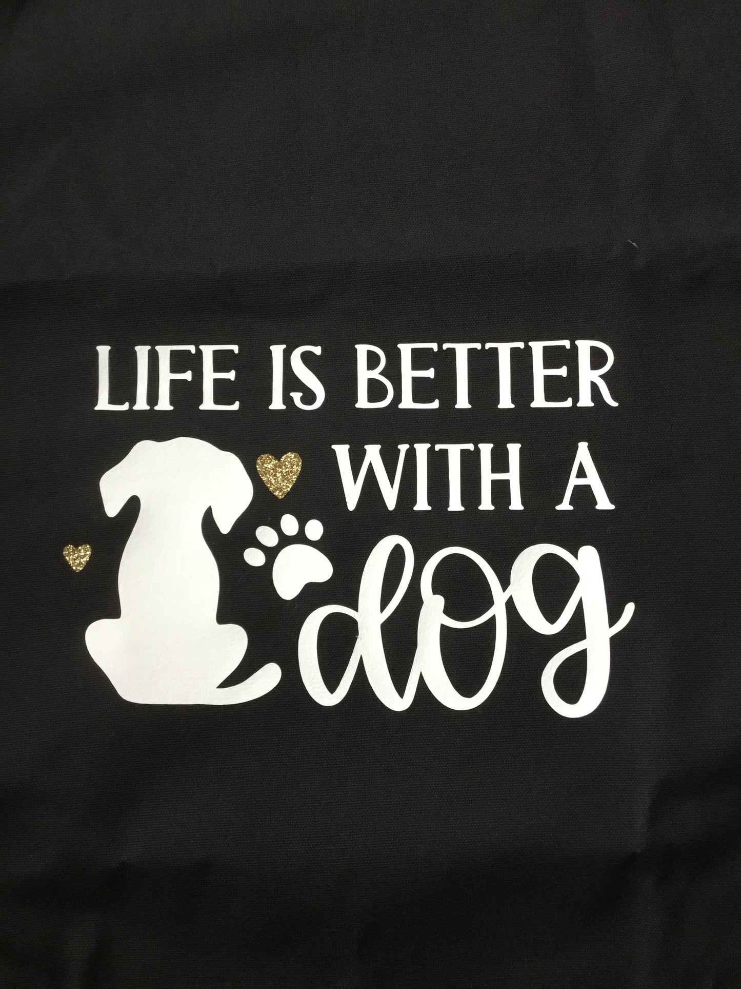 Close up image of life is better tote bag