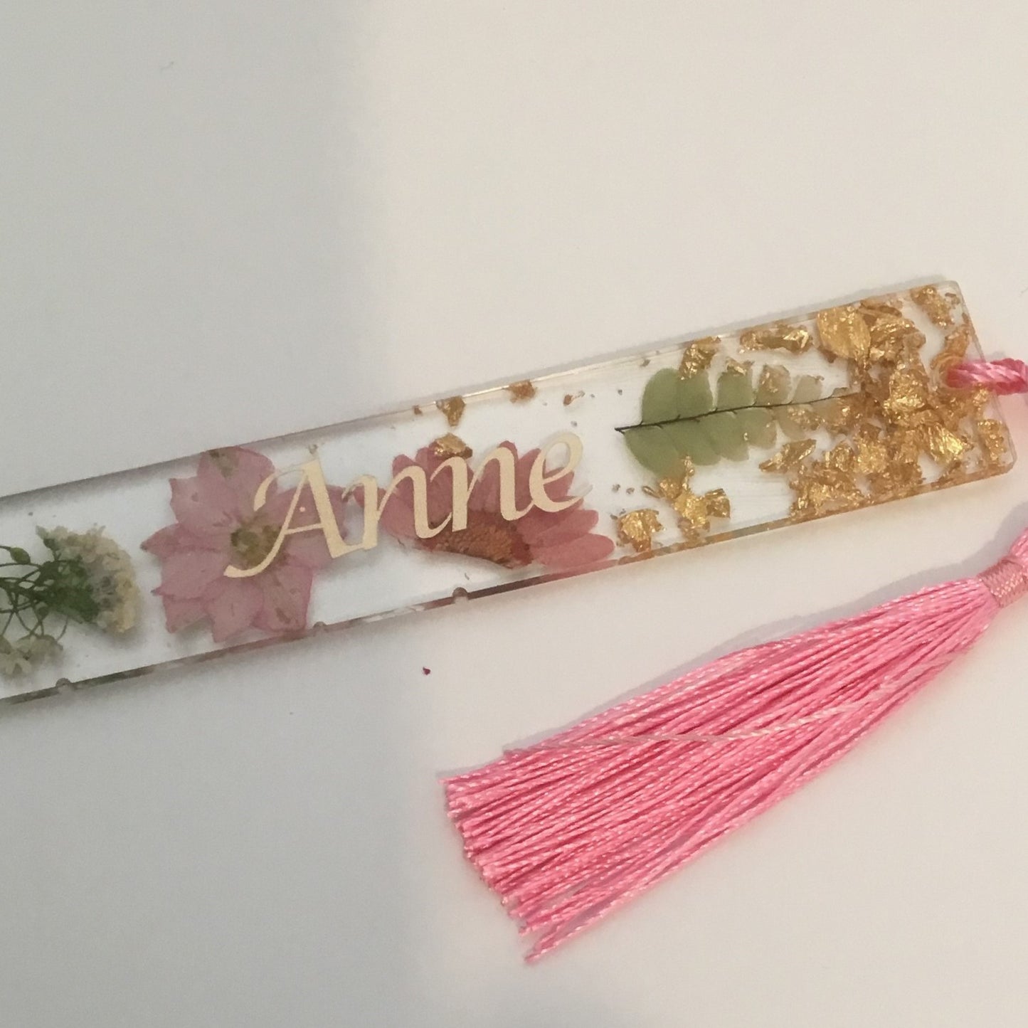 Pink Floral Bookmark, handmade with dried flowers and gold leaf. Personalised with gold text